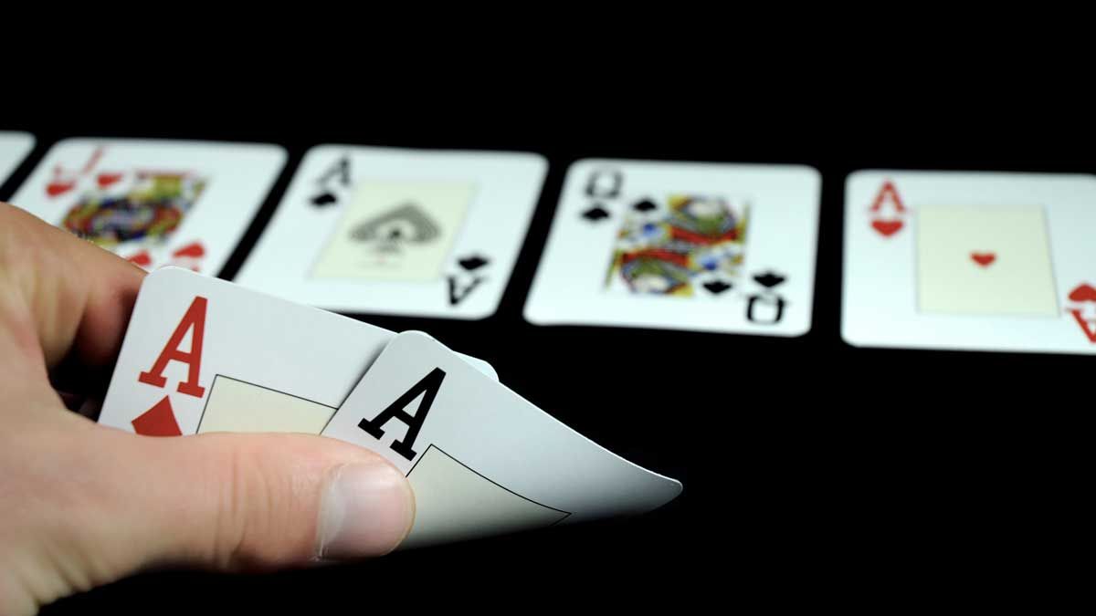 Pocket aces with four of a kind in poker