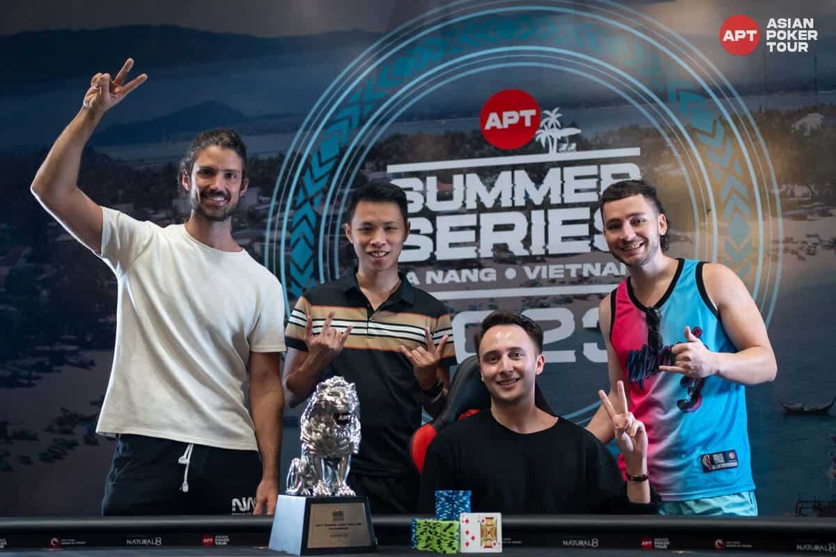 Julian Warhurst celebrates winning the APT Super High Roller - 8 Max with Matthew Bevin, Alan Pham, and Armon Van Wijk