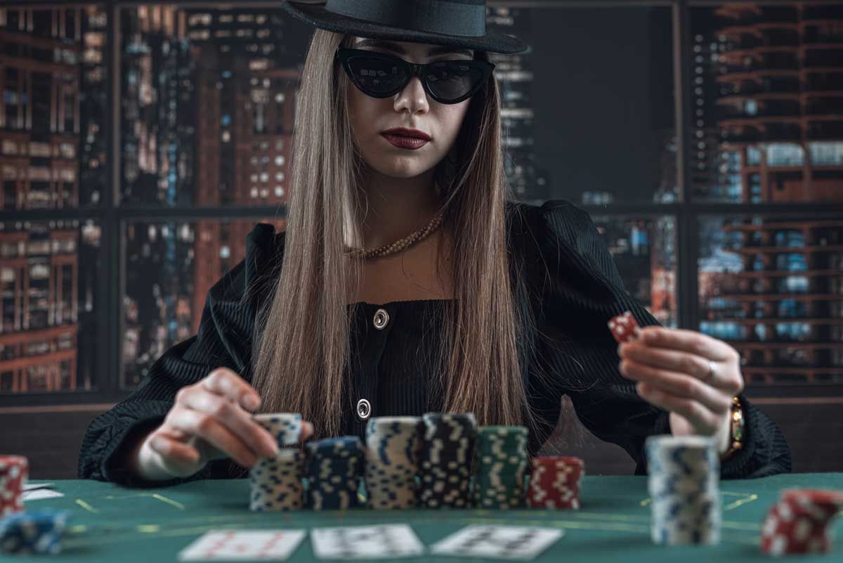 Fashionable woman playing poker